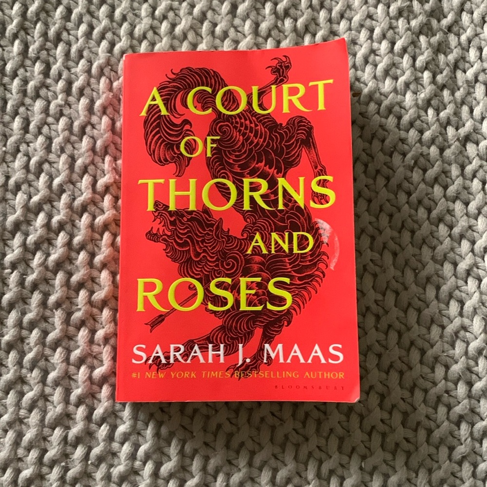 A court of thorns and roses book by Sarah J. Maas